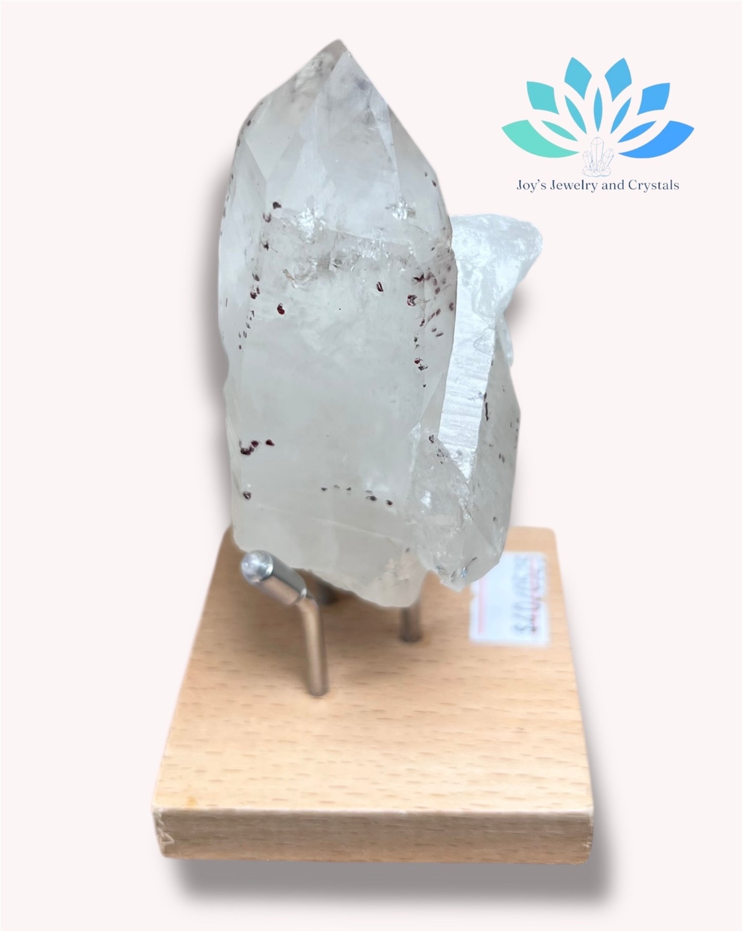 Clear Quartz with Hematite in Stand