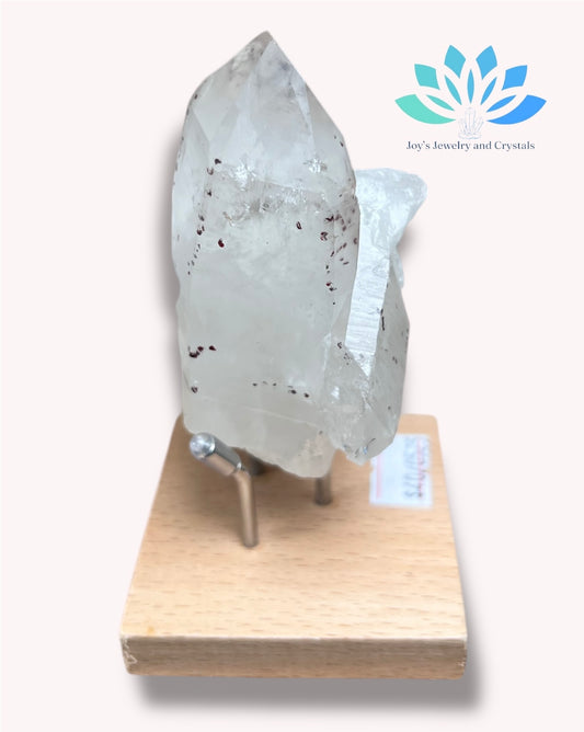 Clear Quartz with Hematite in Stand